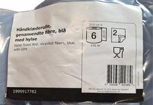 Blauwe handdoekrol etiket